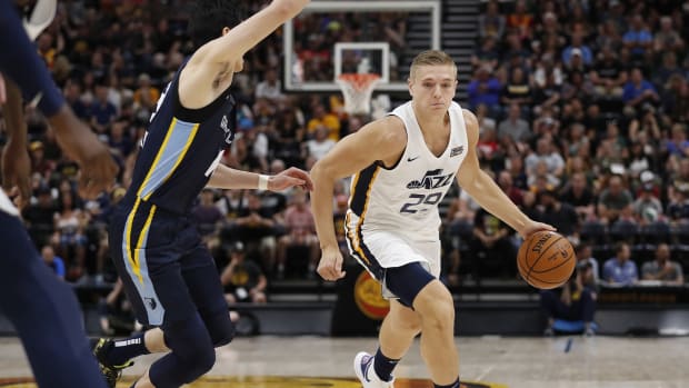 Jul 1, 2019; Salt Lake City, UT, USA; Utah Jazz Tanner McGrew (29) drives to the hoop against Memphis Grizzlies Yuta Watanabe (18) in the third quarter at Vivint Smart Home Arena.